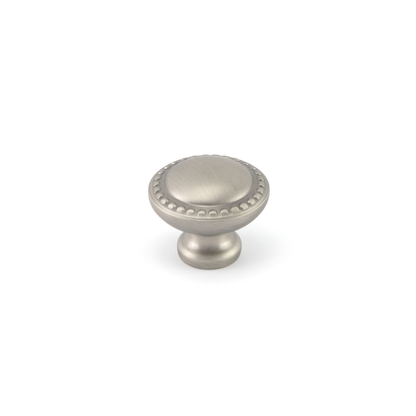 Möbelknopf Kane 30 mm Antik Silber stehend auf weißem Hintergrund